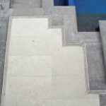 Auswave stainless steel pool drainage grates — aquatic facility specification